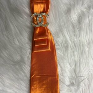 Orange Satin Hair Accessory with Crystal Embellishment
